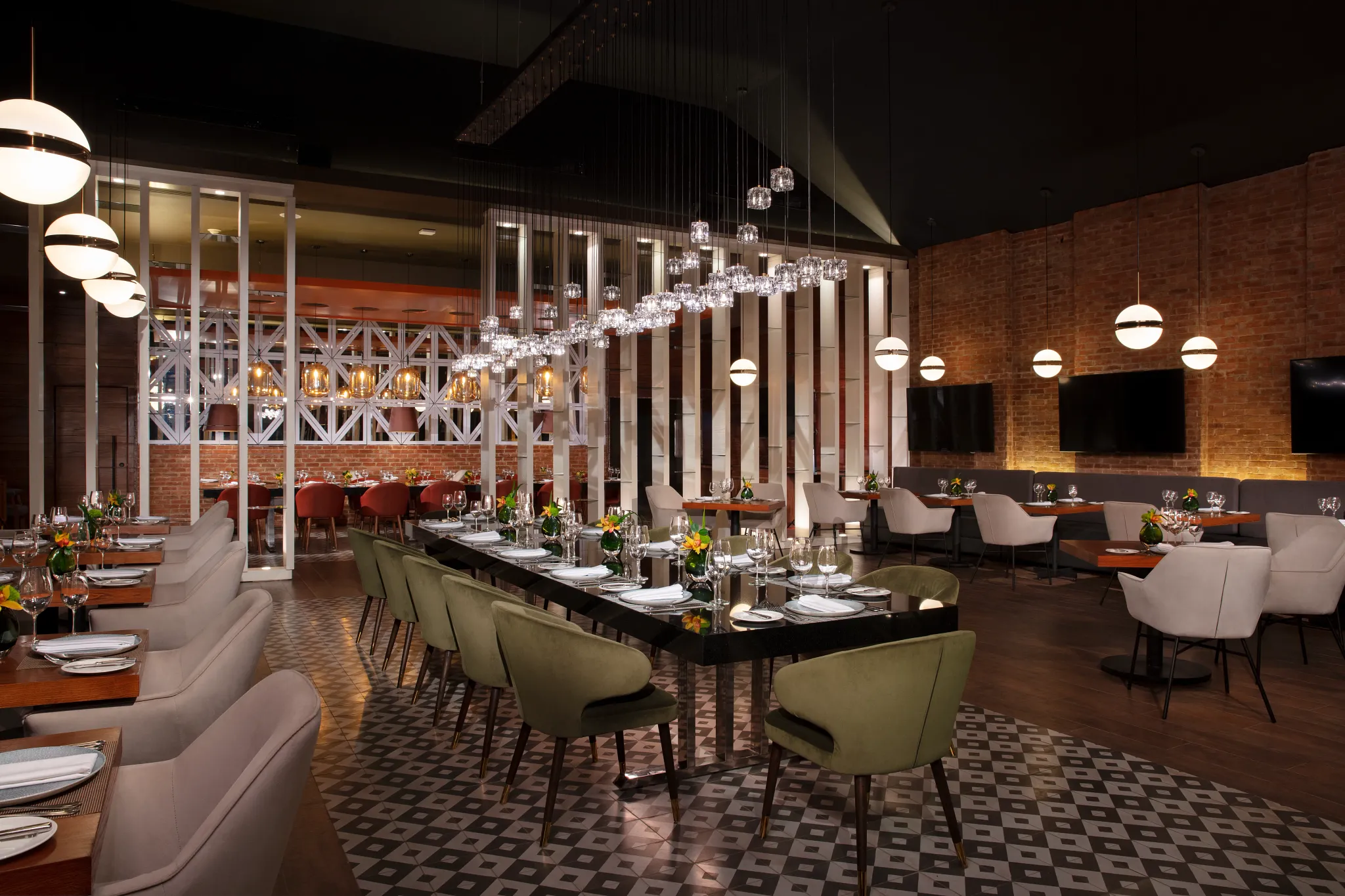 Bluewater Grill restaurant at Secrets Royal Beach Punta Cana featuring elegant indoor dining, modern lighting, and stylish seating.