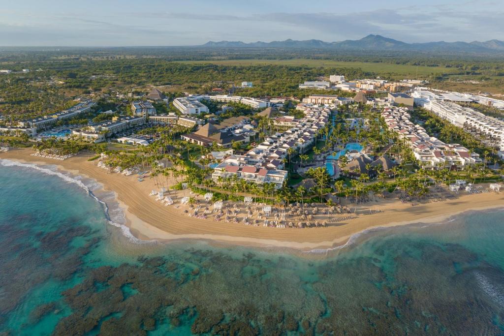 Breathless Punta Cana Resort and Spa adults-only all-inclusive with vibrant pool parties, beachfront energy, and social nightlife atmosphere.