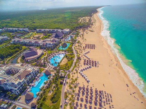 Hard Rock Hotel and Casino Punta Cana all-inclusive resort with massive pools, casino, entertainment, and family-friendly amenities.