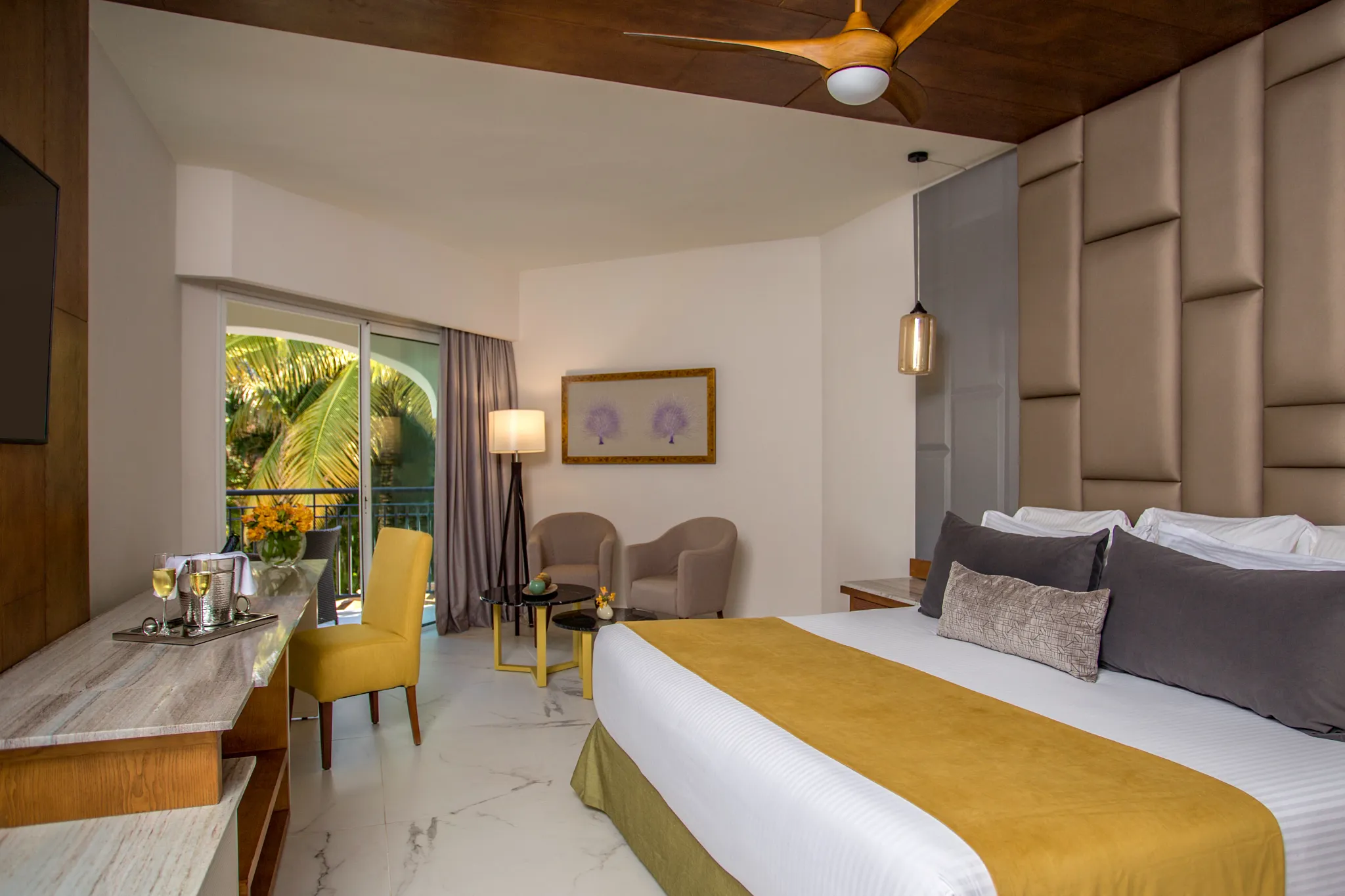 Preferred Club Junior Suite Tropical View with king bed and balcony access at Secrets Royal Beach Punta Cana.